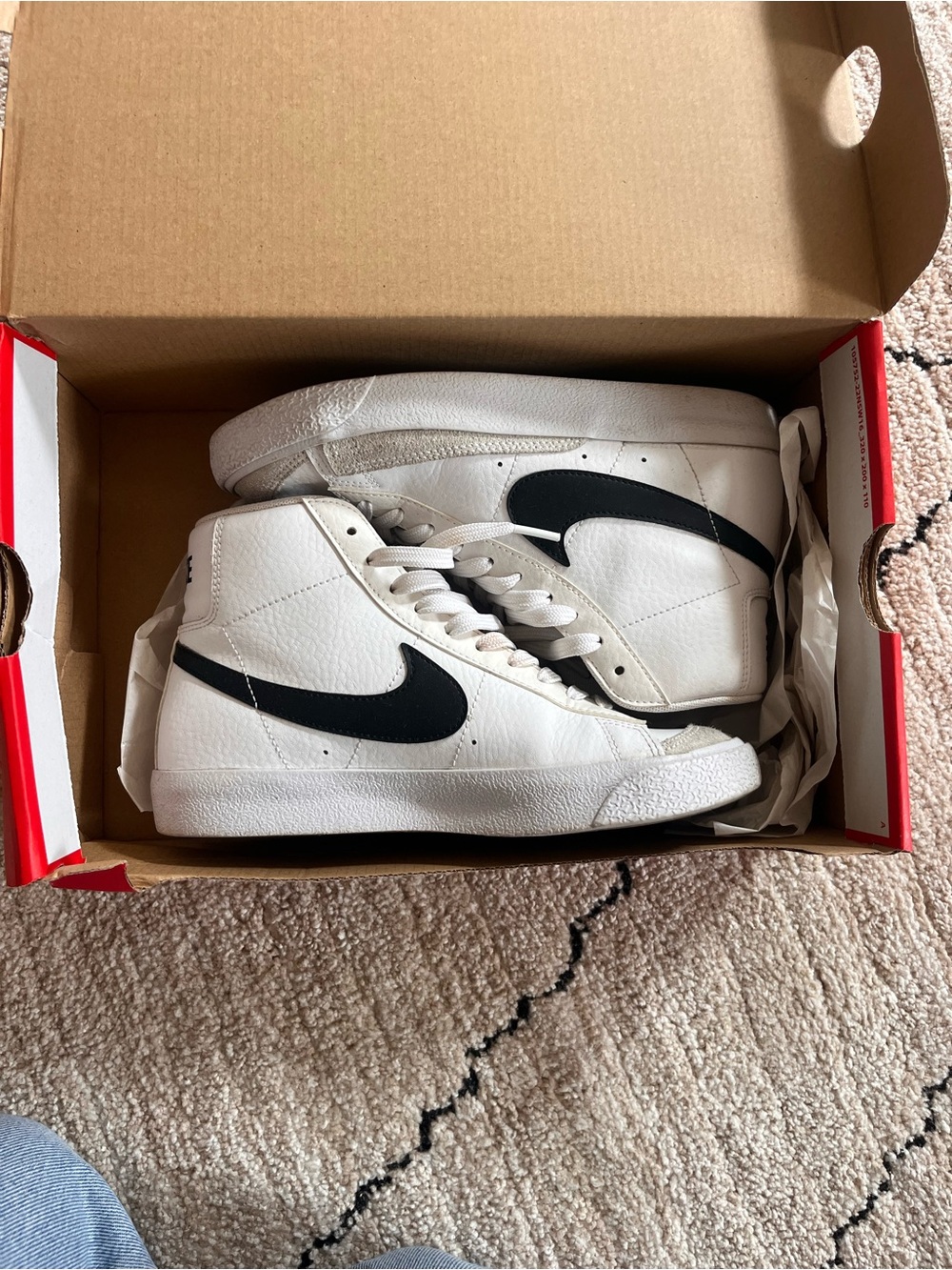 Nike White High-Top Sneakers with Black Swoosh